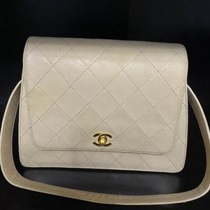 Authentic Chanel lamb skin flap quilted cc lock beige bag